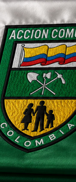 Bandera Acción Comunal con escudo tejido